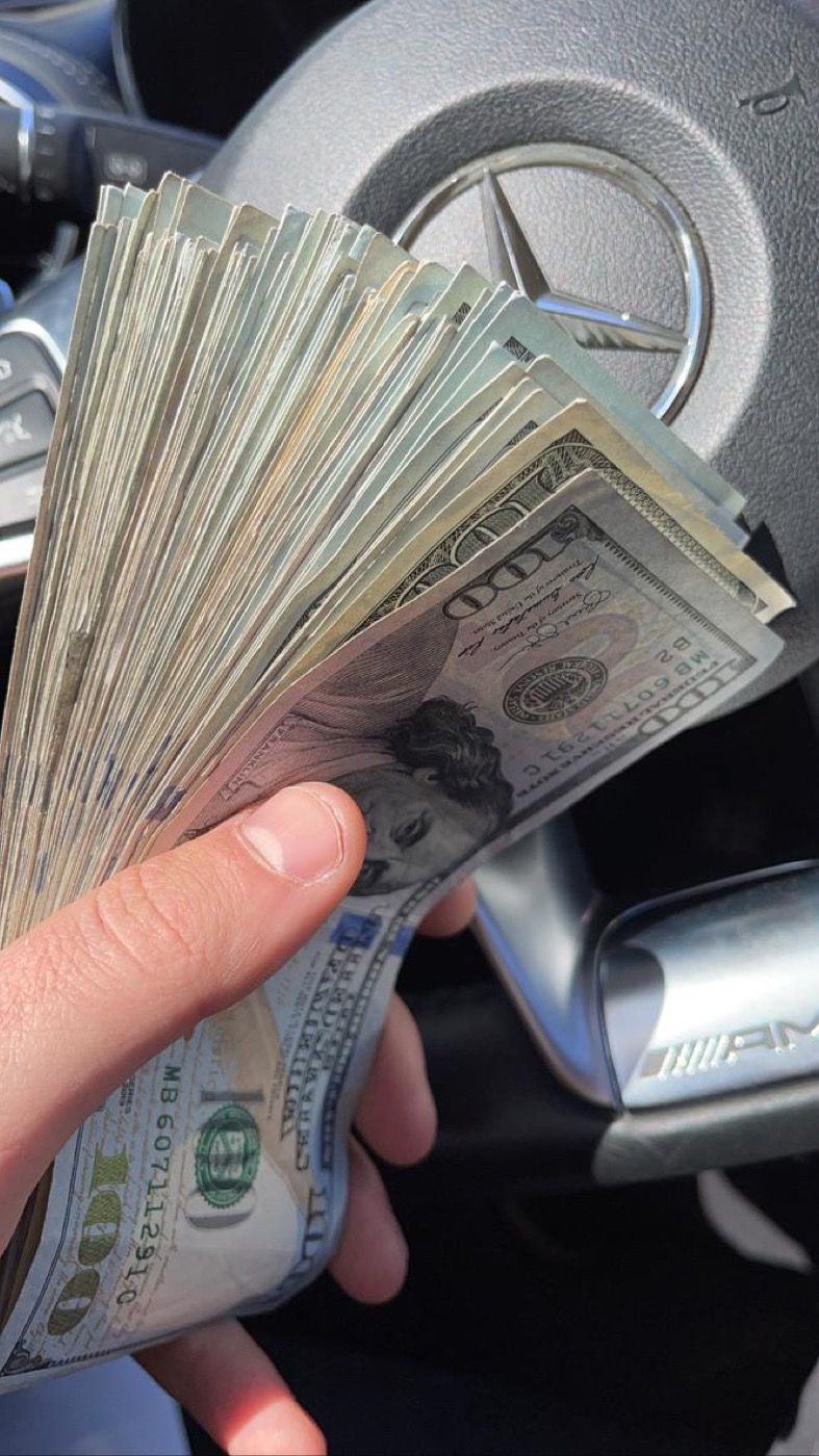 Real money: a YouTube payday in cash, on the steering wheel