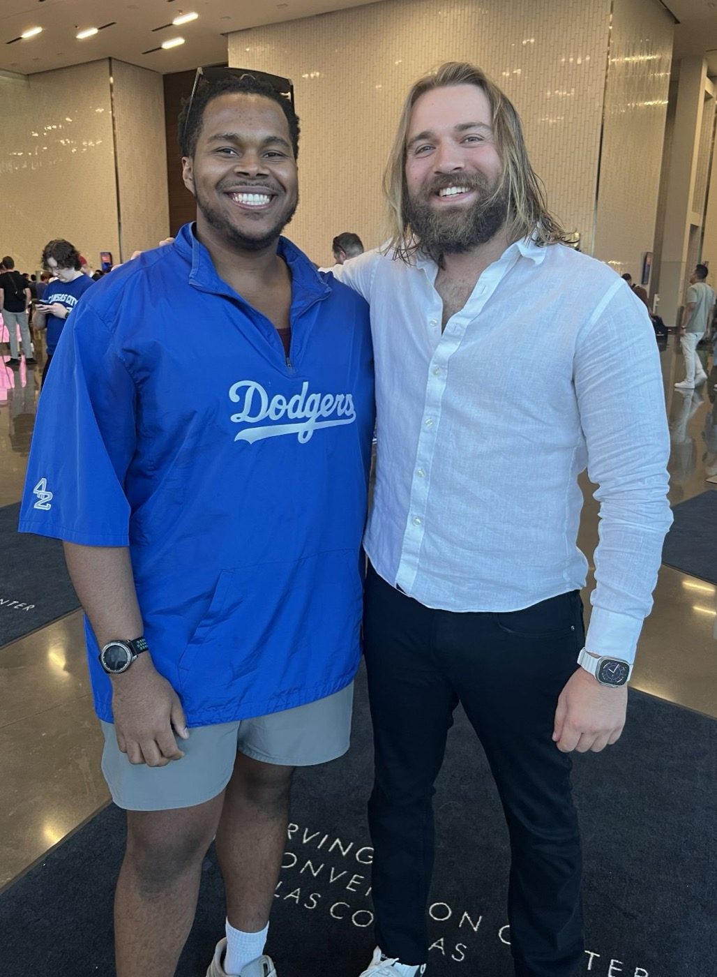 Devon and a Become Viral student at a community event